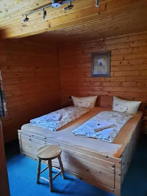 Ein Bett oder Betten in einem Zimmer der Unterkunft Ferienwohnung Haus Waldeck