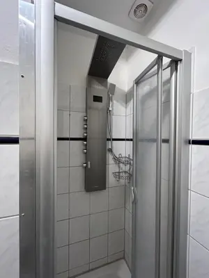 Ein Badezimmer in der Unterkunft Ferienwohnung am Theaterplatz