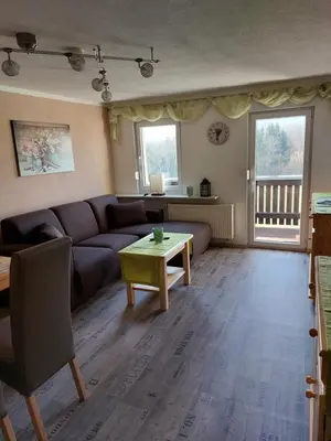 Ein Sitzbereich in der Unterkunft Ferienwohnung Willkommen