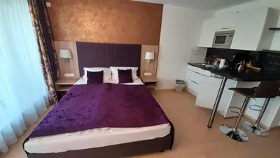 Ein Bett oder Betten in einem Zimmer der Unterkunft Appartements am Schillergarten