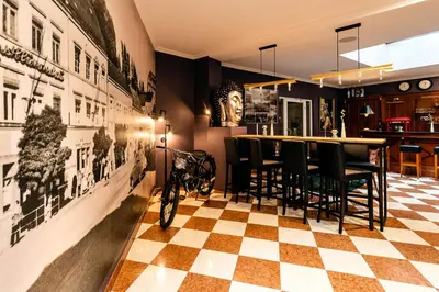 Ein Restaurant oder anderes Speiselokal in der Unterkunft Sebnitzer Hof by STEIGER Hotels