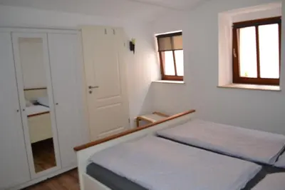Ein Bett oder Betten in einem Zimmer der Unterkunft Ferienwohnung Max 22