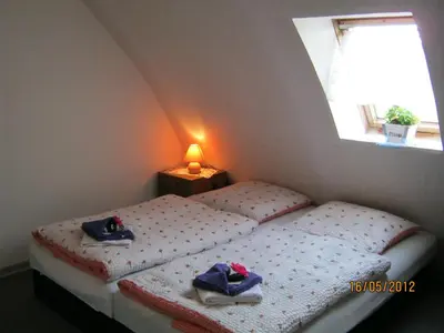 Ein Bett oder Betten in einem Zimmer der Unterkunft Hotel Landhaus Nassau