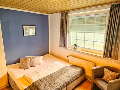 Ein Bett oder Betten in einem Zimmer der Unterkunft Lindenhof Falkenberg