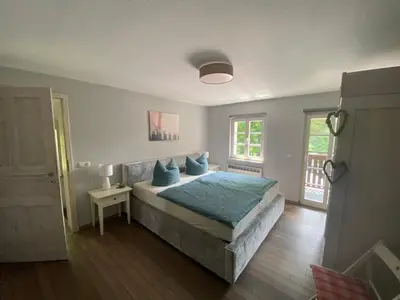 Ein Bett oder Betten in einem Zimmer der Unterkunft Wanderer Paradies