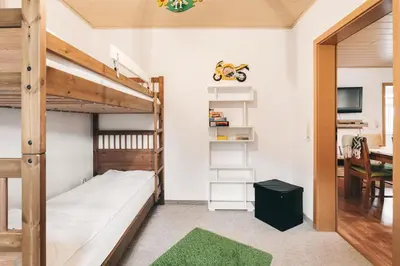 Ein Bett oder Betten in einem Zimmer der Unterkunft Ferienwohnungen Königstein