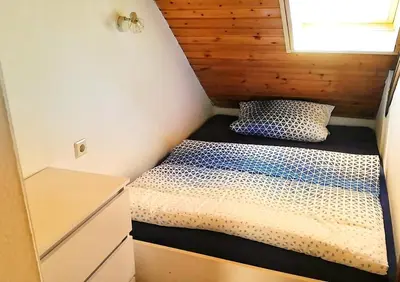 Ein Bett oder Betten in einem Zimmer der Unterkunft Ferienwohnungen Lindenhof