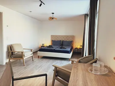 Ein Sitzbereich in der Unterkunft Parkschlößchen Hotel