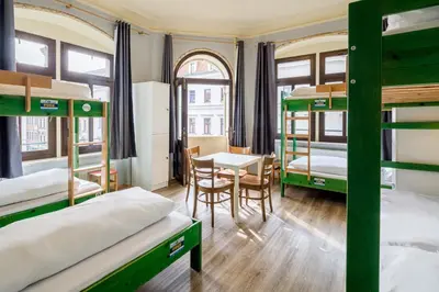 Ein Bett oder Betten in einem Zimmer der Unterkunft Hostel Mondpalast
