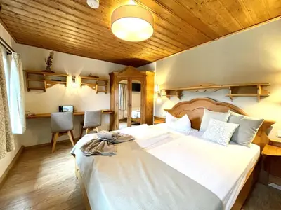 Ein Bett oder Betten in einem Zimmer der Unterkunft Naturhotel Gasthof Bärenfels