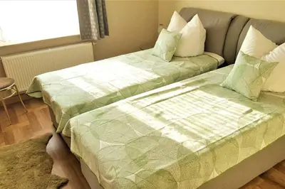 Ein Bett oder Betten in einem Zimmer der Unterkunft Fewo Radeberg