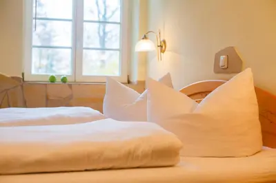 Ein Bett oder Betten in einem Zimmer der Unterkunft Gasthof Ungerberg