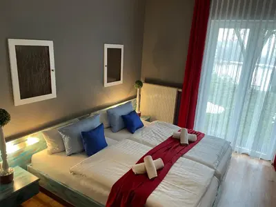 Ein Bett oder Betten in einem Zimmer der Unterkunft Berghotel Drei Brüder Höhe