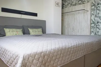 Ein Bett oder Betten in einem Zimmer der Unterkunft Neustadt-Aussicht - große Wohnung mit Balkon