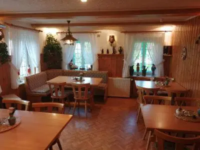 Ein Sitzbereich in der Unterkunft Helenenhof