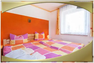 Ein Bett oder Betten in einem Zimmer der Unterkunft Gasthaus Falkenhain