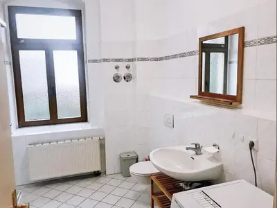 Ein Badezimmer in der Unterkunft Familienfreundliches Apartment im Zentrum für Geschäftsreisen und privat