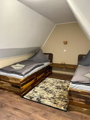 Ein Bett oder Betten in einem Zimmer der Unterkunft Ferienhaus Ostrauer Hof