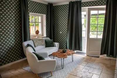Ein Sitzbereich in der Unterkunft Ferienhaus Ostrauer Hof