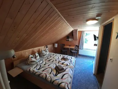 Ein Bett oder Betten in einem Zimmer der Unterkunft FeWo Bockmühle