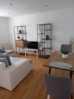 Ein Sitzbereich in der Unterkunft Ferienwohnung Salzmannhaus