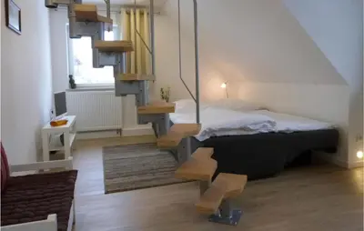 Ein Bett oder Betten in einem Zimmer der Unterkunft Amazing Home In Pulsnitz With Kitchen