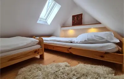 Ein Bett oder Betten in einem Zimmer der Unterkunft Amazing Home In Pulsnitz With Kitchen