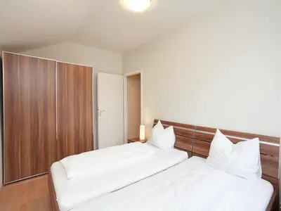 Ein Bett oder Betten in einem Zimmer der Unterkunft Ferienhaus in Rechenberg-Bienemuehle