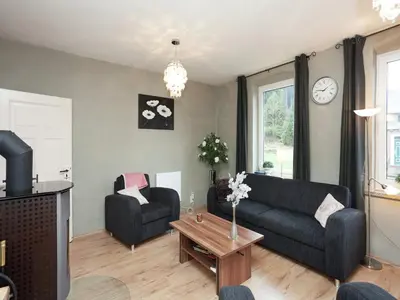Ein Sitzbereich in der Unterkunft Ferienhaus in Rechenberg-Bienemuehle