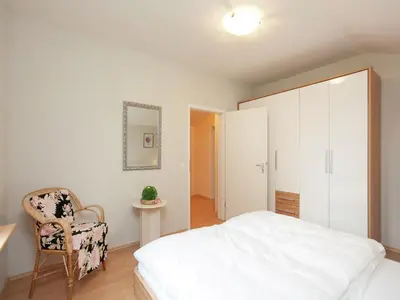 Ein Bett oder Betten in einem Zimmer der Unterkunft Ferienhaus in Rechenberg-Bienemuehle
