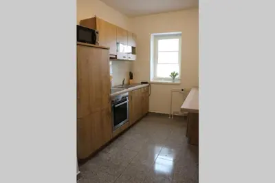 Küche/Küchenzeile in der Unterkunft Zentralgelegene 4-Raum Ferienwohnung bis 8 Pers.