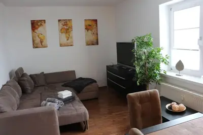 Ein Sitzbereich in der Unterkunft Zentralgelegene 4-Raum Ferienwohnung bis 8 Pers.