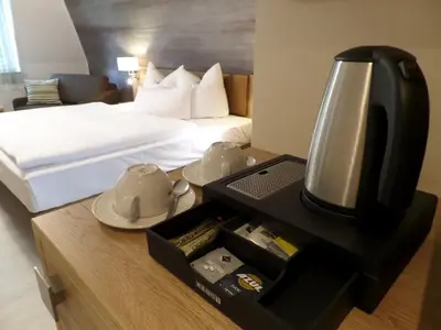 Ein Bett oder Betten in einem Zimmer der Unterkunft C-YOU Hotel Chemnitz
