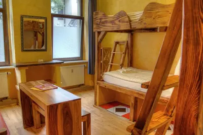 Ein Bett oder Betten in einem Zimmer der Unterkunft Gästehaus Mezcalero