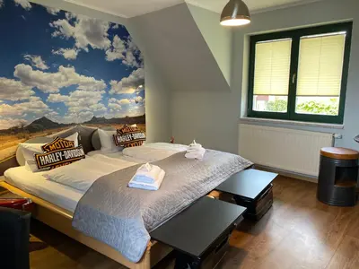 Ein Bett oder Betten in einem Zimmer der Unterkunft Hotel-Pension Mandy - Adults Only