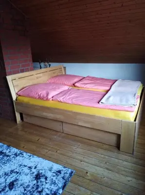 Ein Bett oder Betten in einem Zimmer der Unterkunft Ferienhaus Ullrich