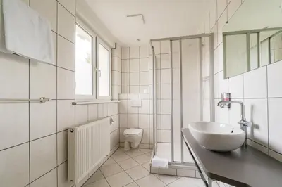 Ein Badezimmer in der Unterkunft Hotel Villa am Waldschlösschen