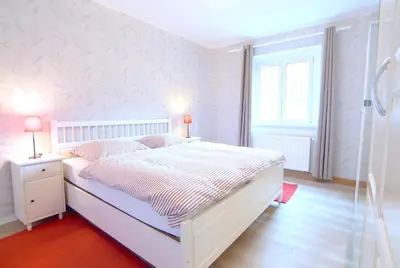 Ein Bett oder Betten in einem Zimmer der Unterkunft Haus Donnerberg Rehefeld