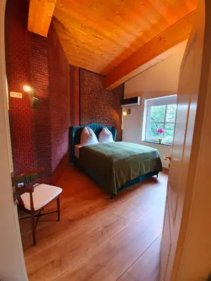 Ein Bett oder Betten in einem Zimmer der Unterkunft Storchennest