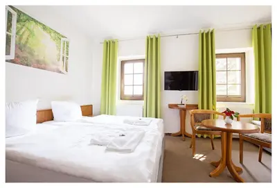 Ein Bett oder Betten in einem Zimmer der Unterkunft Hotel Hähnel