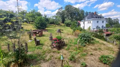 Ein Garten an der Unterkunft Ferienwohnung Erzgebirgswohnung Götze