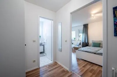 Ein Bett oder Betten in einem Zimmer der Unterkunft EG Wohnung, zentral, TOP Anbindung, mit großer Terrasse