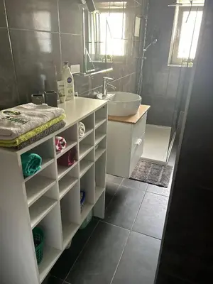 Ein Badezimmer in der Unterkunft MyHome Einsiedel an der Zwönitz 1