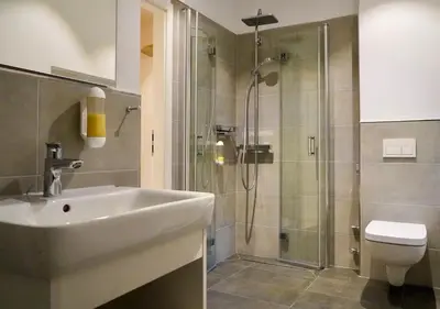 Ein Badezimmer in der Unterkunft Bergpension Laasen Perle Rathen