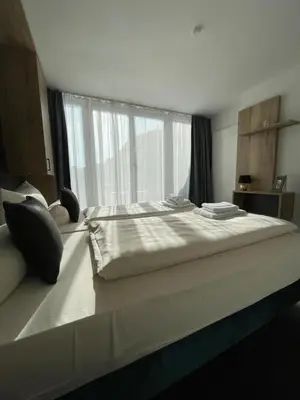 Ein Bett oder Betten in einem Zimmer der Unterkunft Maisonette-Apartment An der Frauenkirche