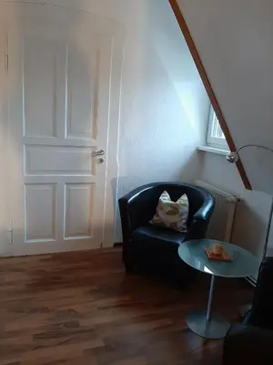 Ein Sitzbereich in der Unterkunft Ferienhaus Elbsommer am Weinberg II