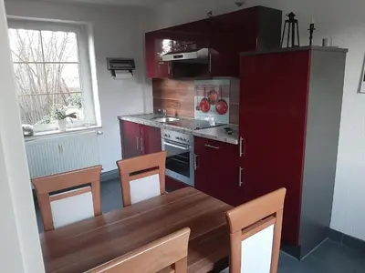 Küche/Küchenzeile in der Unterkunft Ferienhaus Elbsommer am Weinberg II