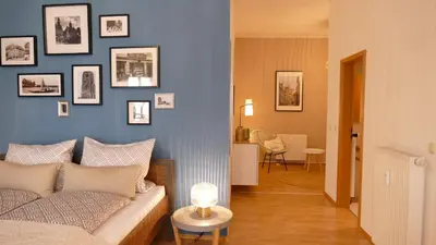 Ein Bett oder Betten in einem Zimmer der Unterkunft Pirna Altstadtgeflüster