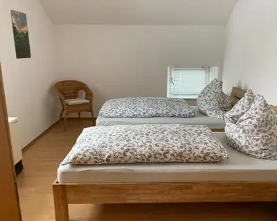 Ein Bett oder Betten in einem Zimmer der Unterkunft Ferienwohnung Zweinig02