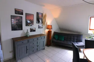 Ein Sitzbereich in der Unterkunft Ferienwohnung am Barockgarten